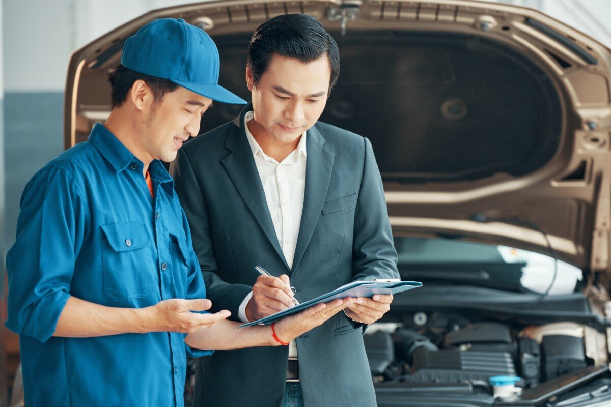 Man entering into a contract with a car service