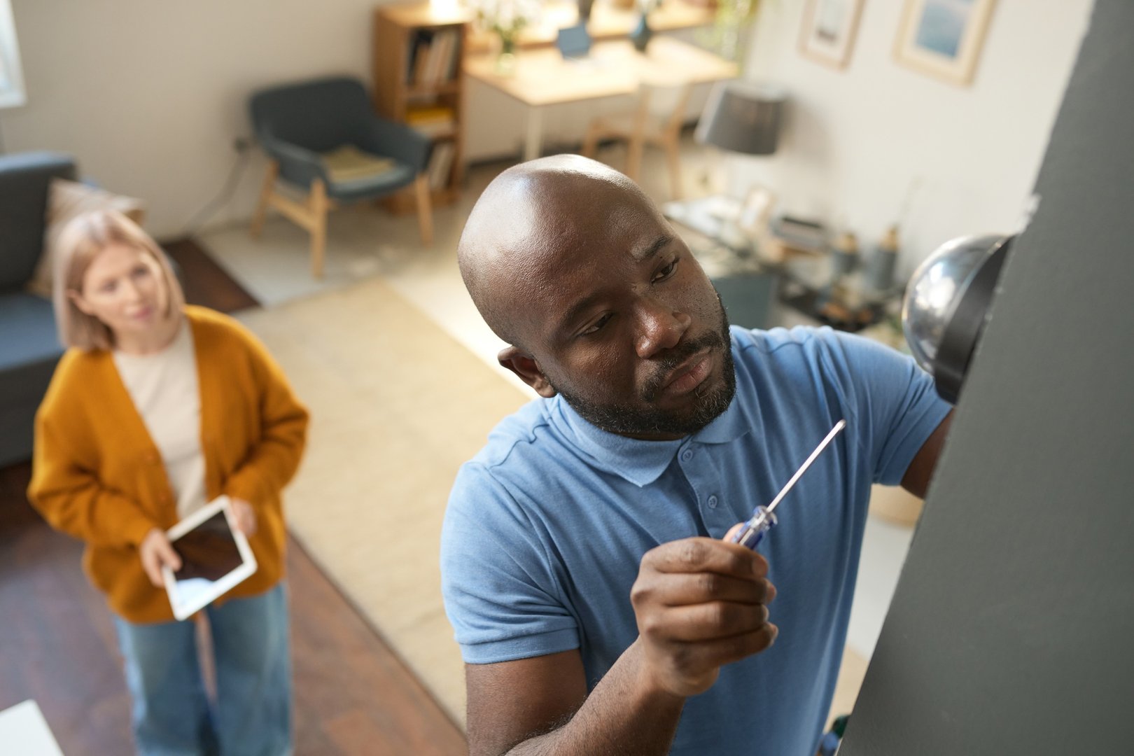 Black Man Doing Home Repairs