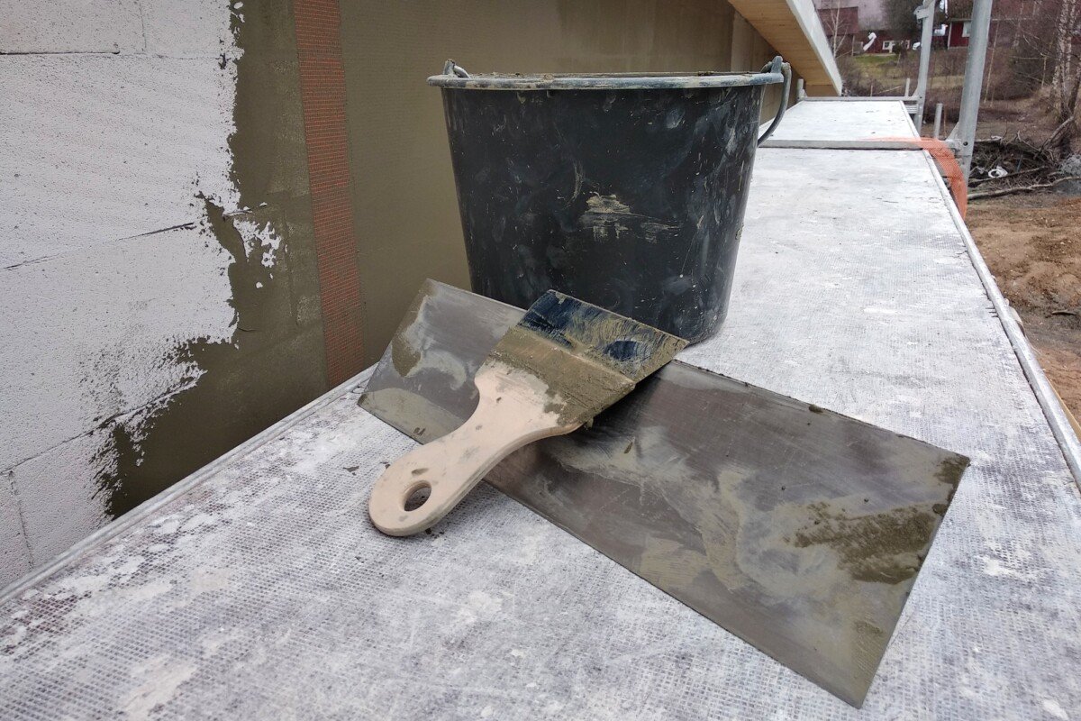 Tools and material foe covering walls with protective adhesive before finish paint.