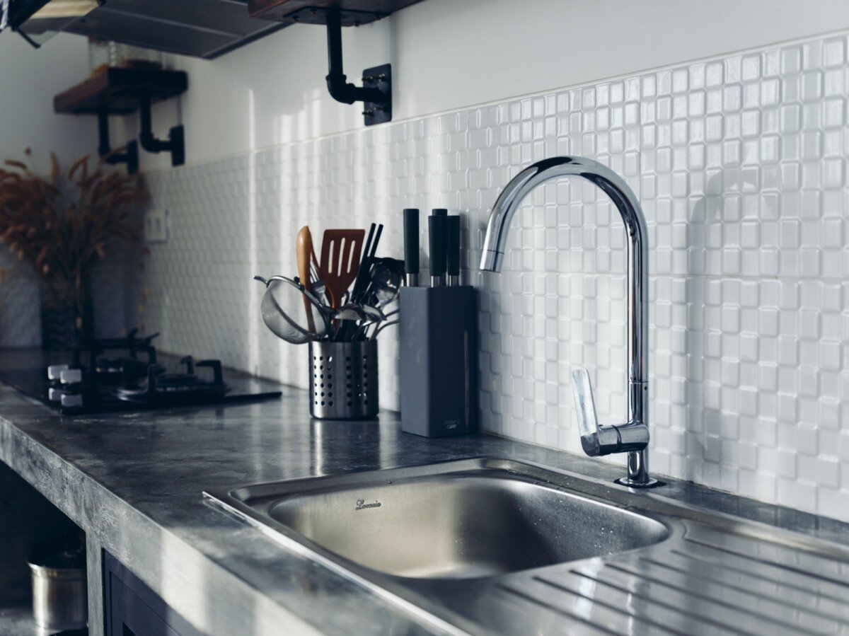 Modern kitchen sink, stylish interior.