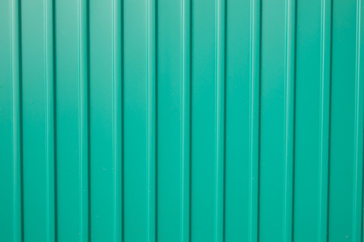 texture background green metal siding to finish the outside