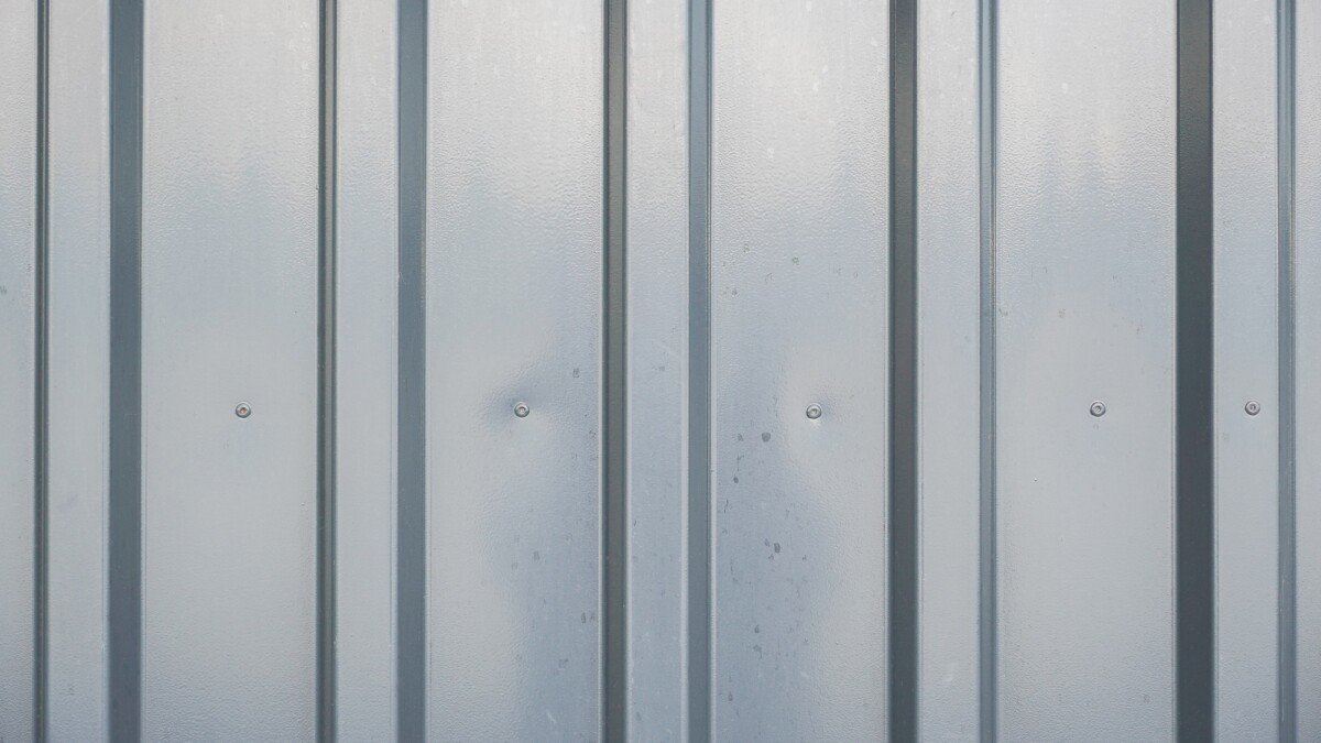 corrugated metal panel siding as silver metallic wall background