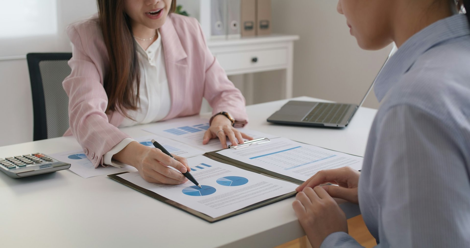 happy-couple-with-contract-approval-banker-approving-loan-investment-.jpg