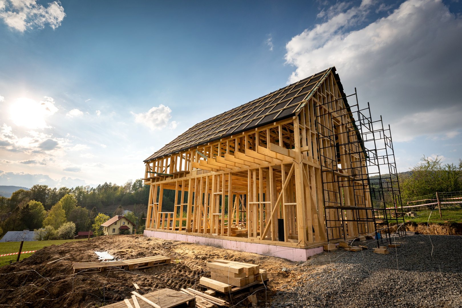 Residential home construction, frame wooden house outdoor