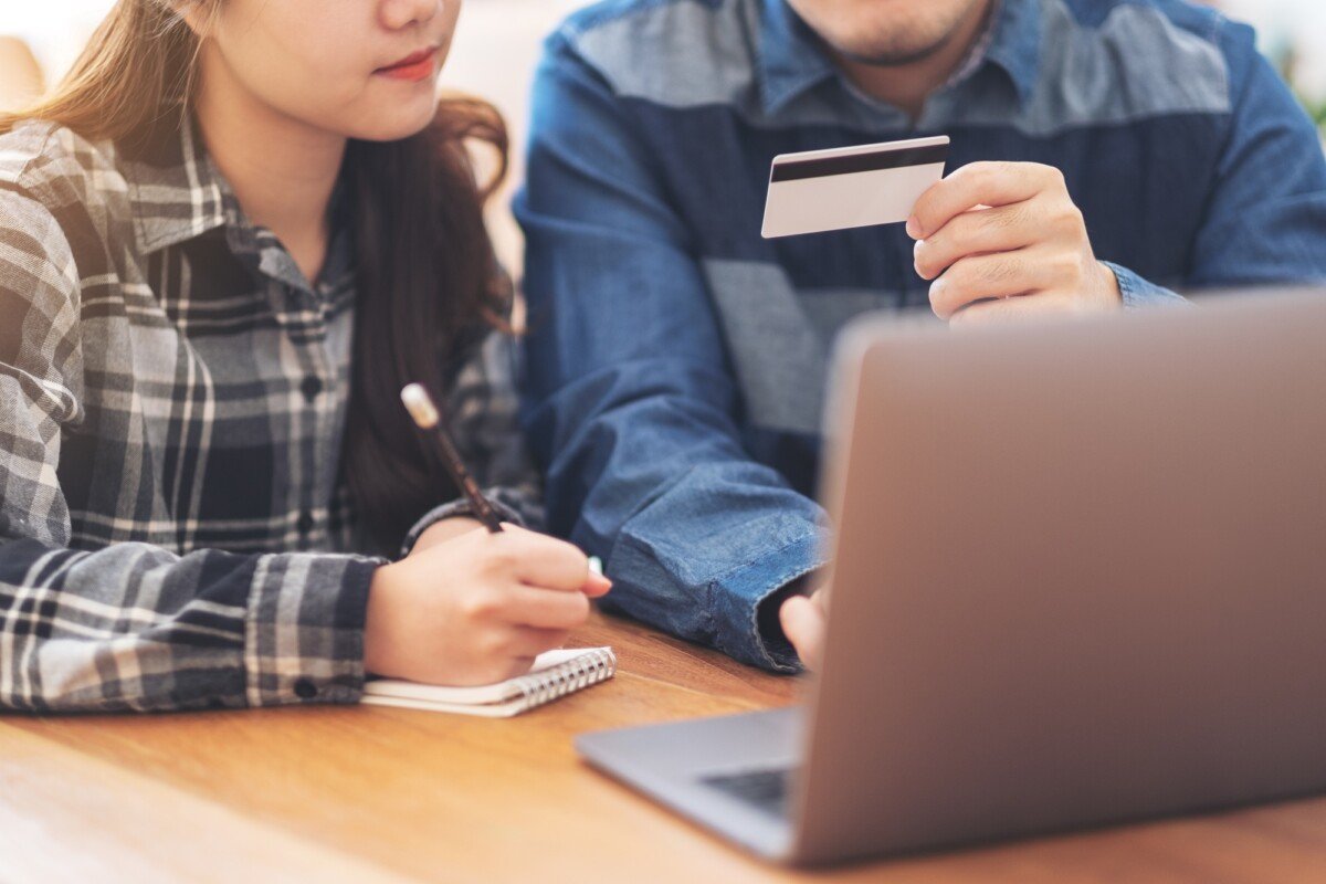 Businessman using credit card for purchasing and shopping online