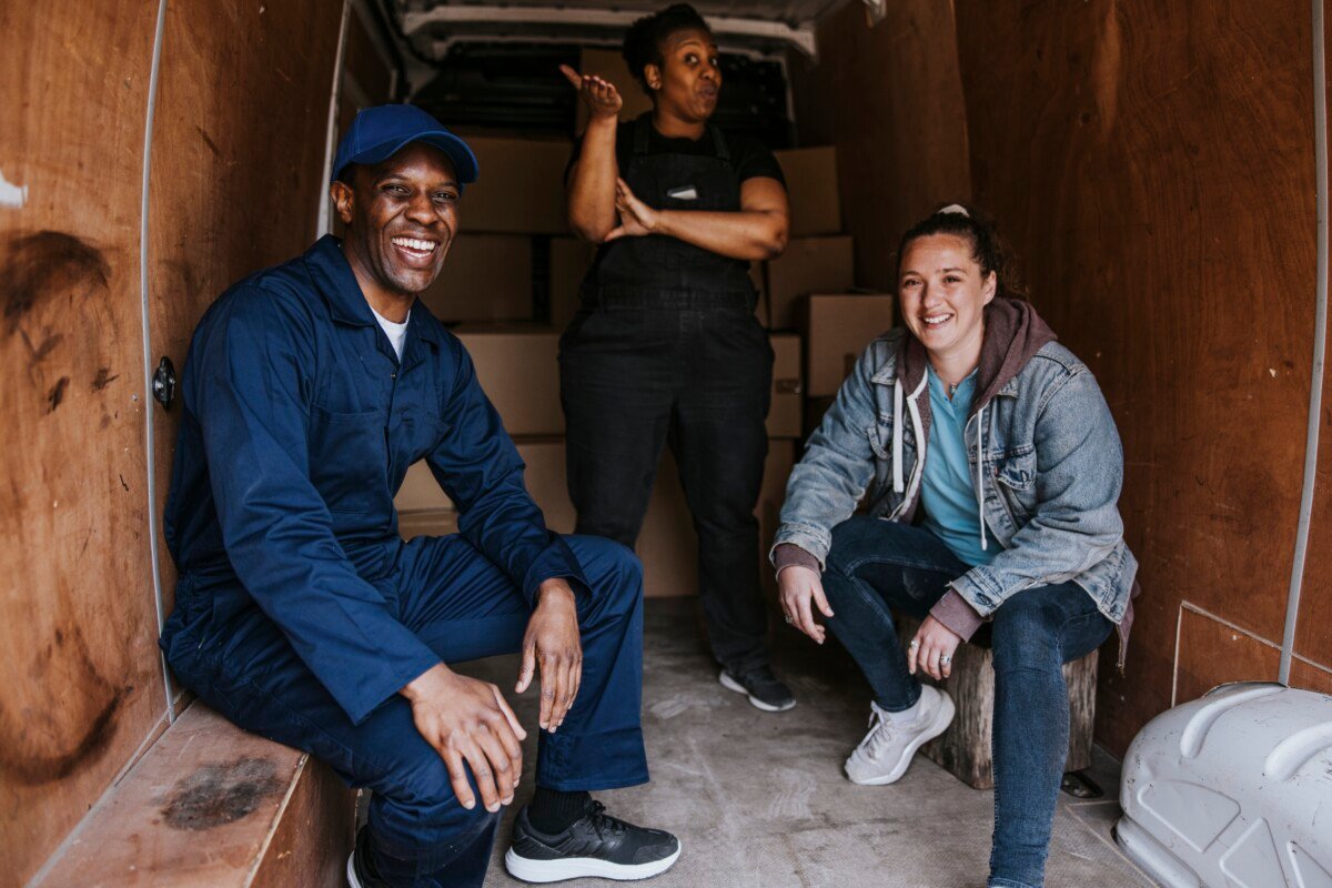 Happy removal service workers, home moving