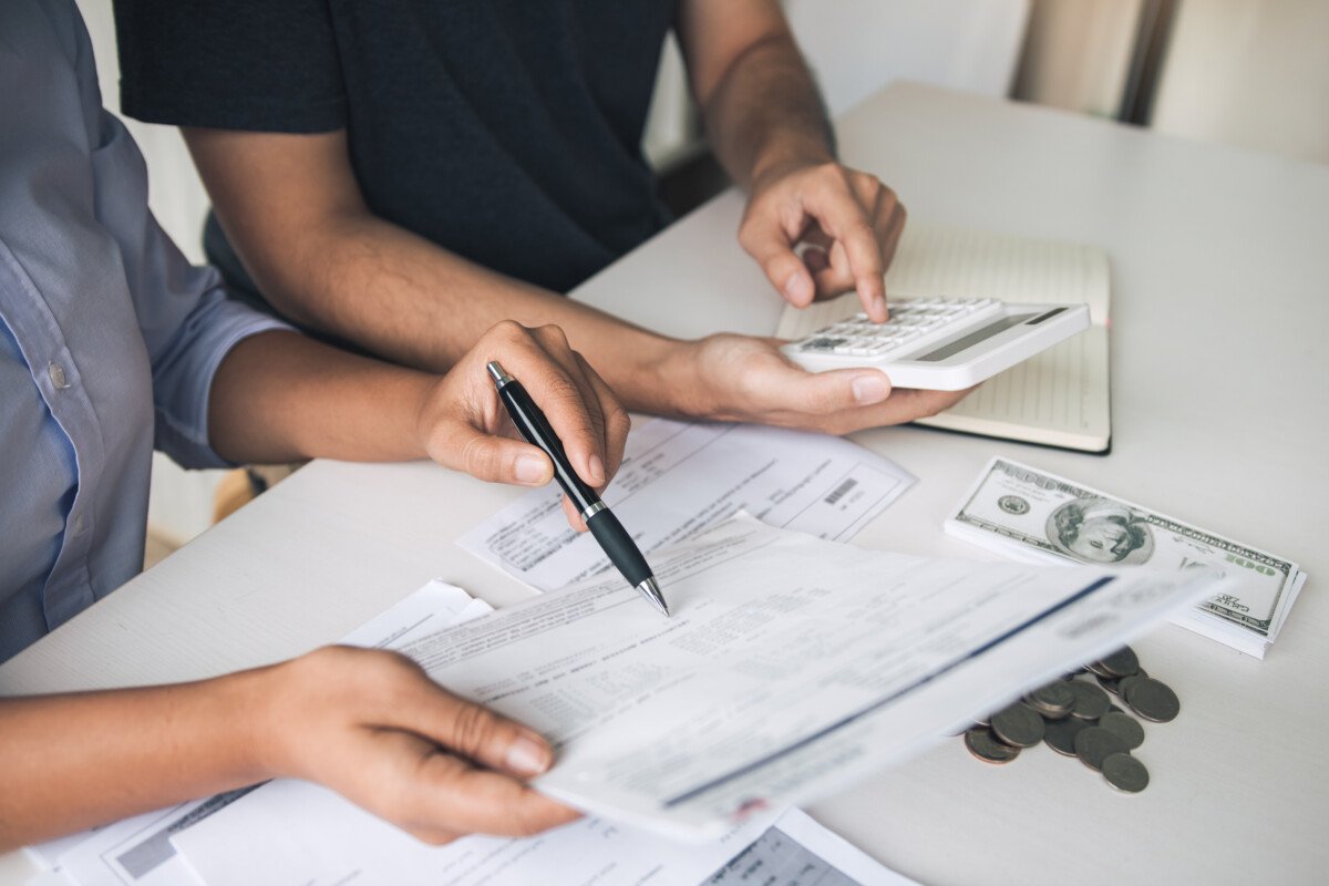 Two asian couples and men and women are together analyzing expenses or finances in deposit accounts and daily income…