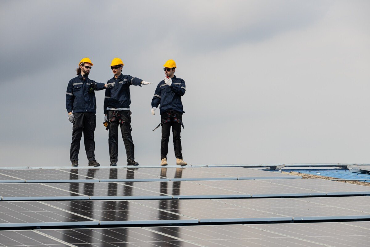Professional Engineer Service Solar Panel. Worker Maintenance Cleaning Replacing Solar Panel.