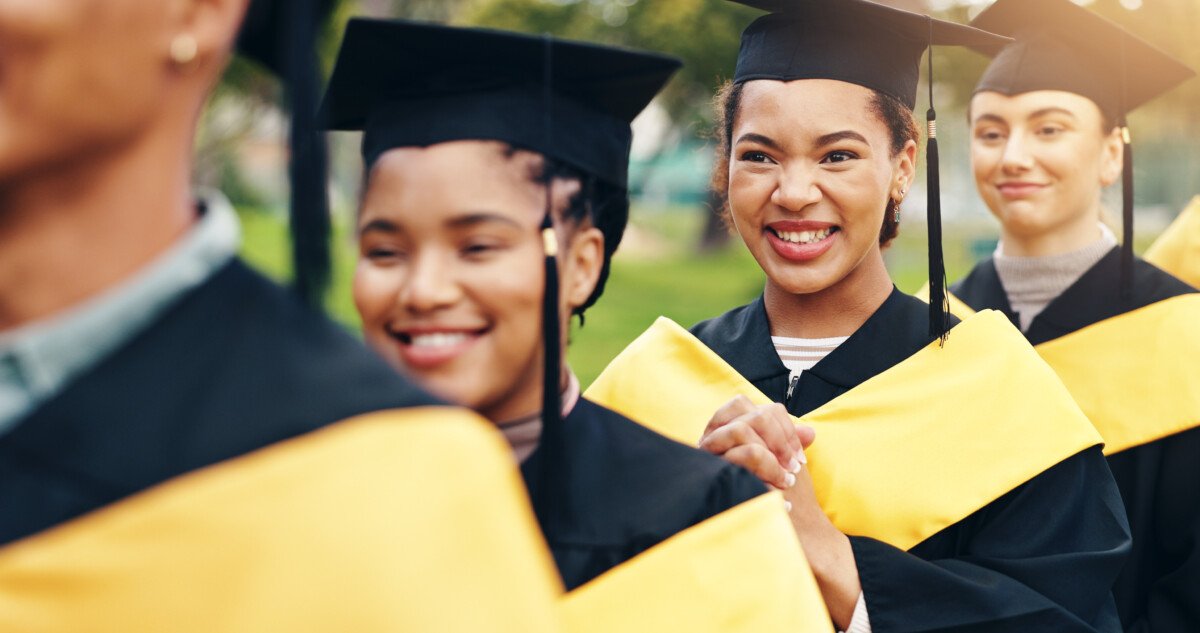 Row, graduation and people outdoor at university for achievement in degree, certificate or diploma