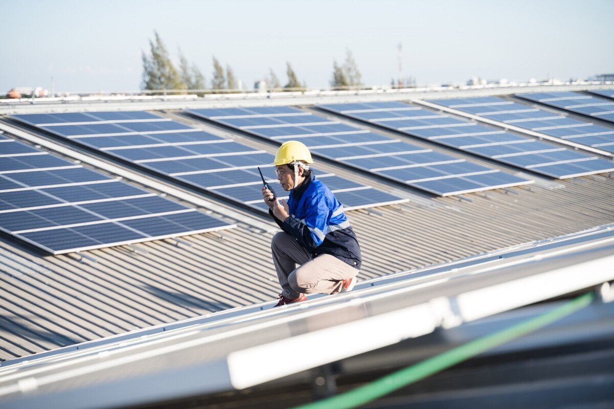 photovoltaic solar panels solar cells on roof top factory.