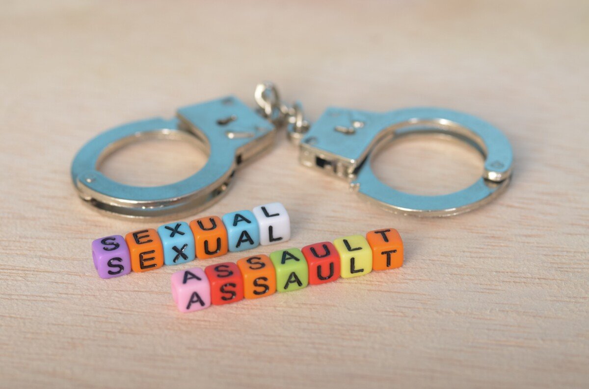 Sexual Assault Awareness: Justice and Accountability Represented by Handcuffs and Beads
