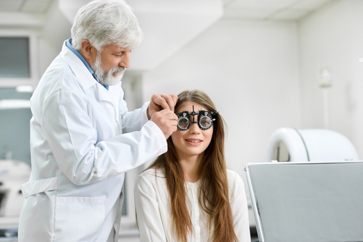 Skilled oculist trying visual inspection device