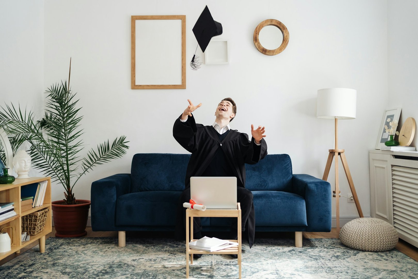 Caucasian young man feeling very excited to receive his bachelors degree