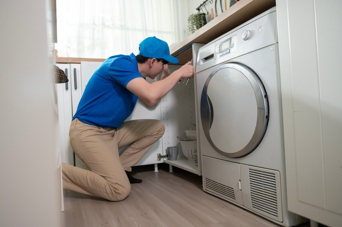 Technician service man checking electrical appliances