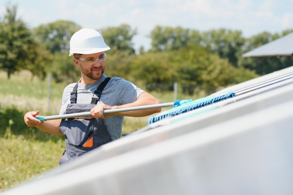 man cleaning, solar power washing.