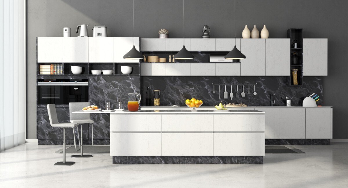 Modern kitchen in black and white marble with island and stools – 3d rendering